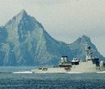 Irish Naval vessel sails past An Tiaracht